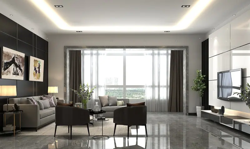 Sala de estar com sofás cinza diante de um janelão com cortinas claras e escuras nas laterais