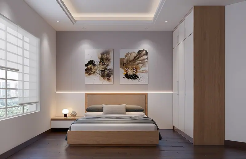 Quarto claro com cama de casal, quadros na parede e janela com persiana ao lado
